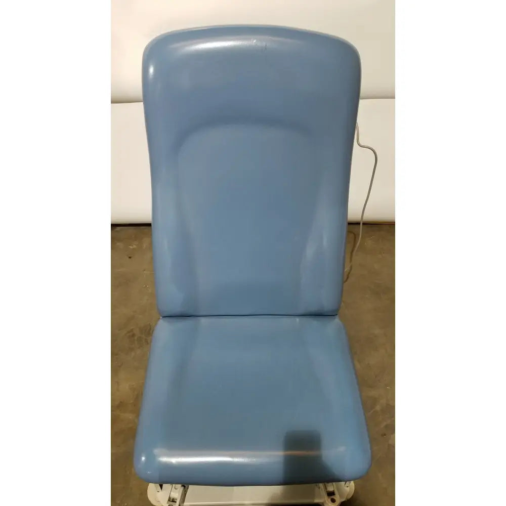Blue padded umf 4070 power table with hand control features adjustable height and smooth glossy vinyl finish for reuse medical use