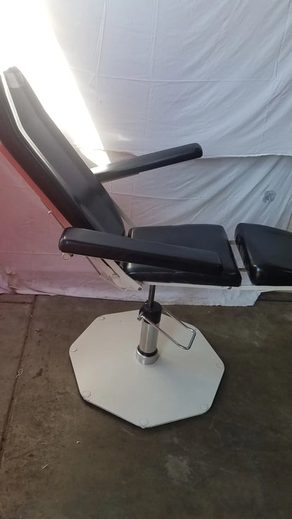 Umf medical 8675 black leather adjustable phlebotomy chair with white octagonal base and chrome adjustment mechanism