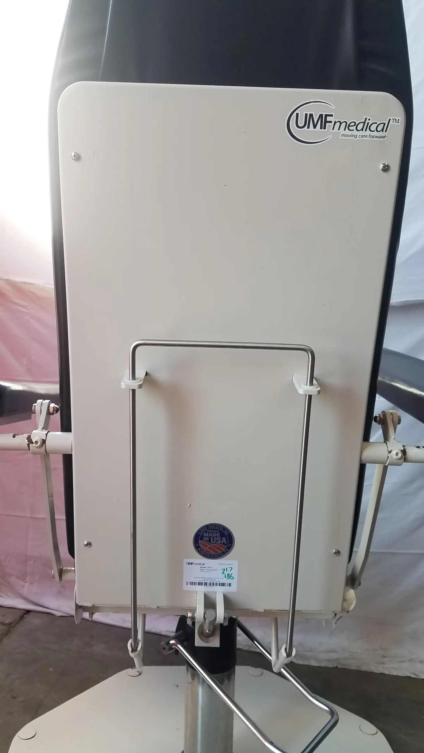 White umfmedical 8675 adjustable phlebotomy chair with metal frame and adjustable armrests for medical use