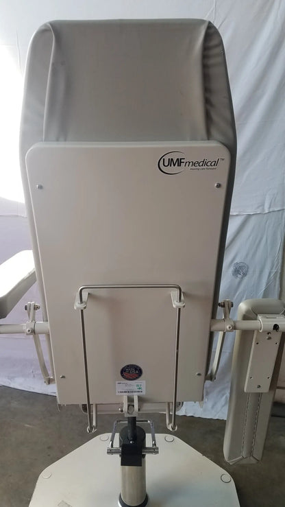 Umfmedical 8675 phlebotomy chair with light gray padded backrest and beige metal frame adjustable examination chair