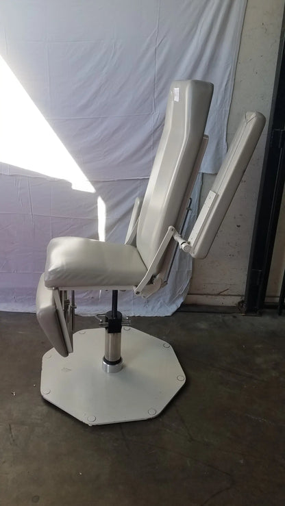 Beige upholstered umf medical 8675 phlebotomy chair with adjustable armrests and hexagonal base for medical use