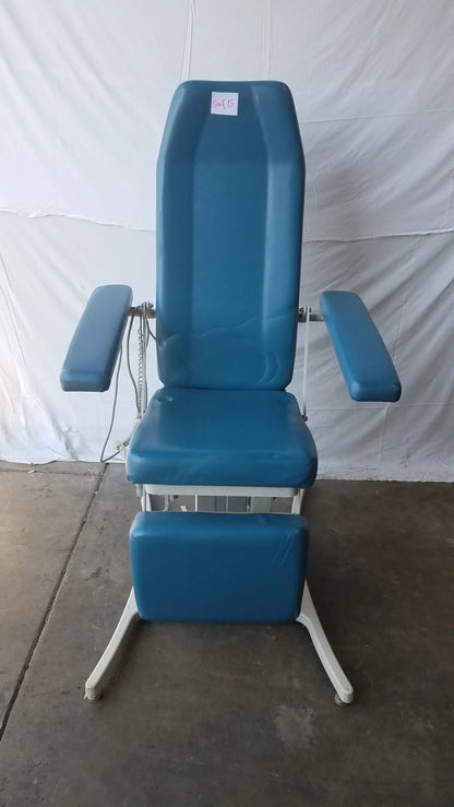 Blue padded power exam phlebotomy chair with adjustable armrests and white metal frame by umf medical equipment