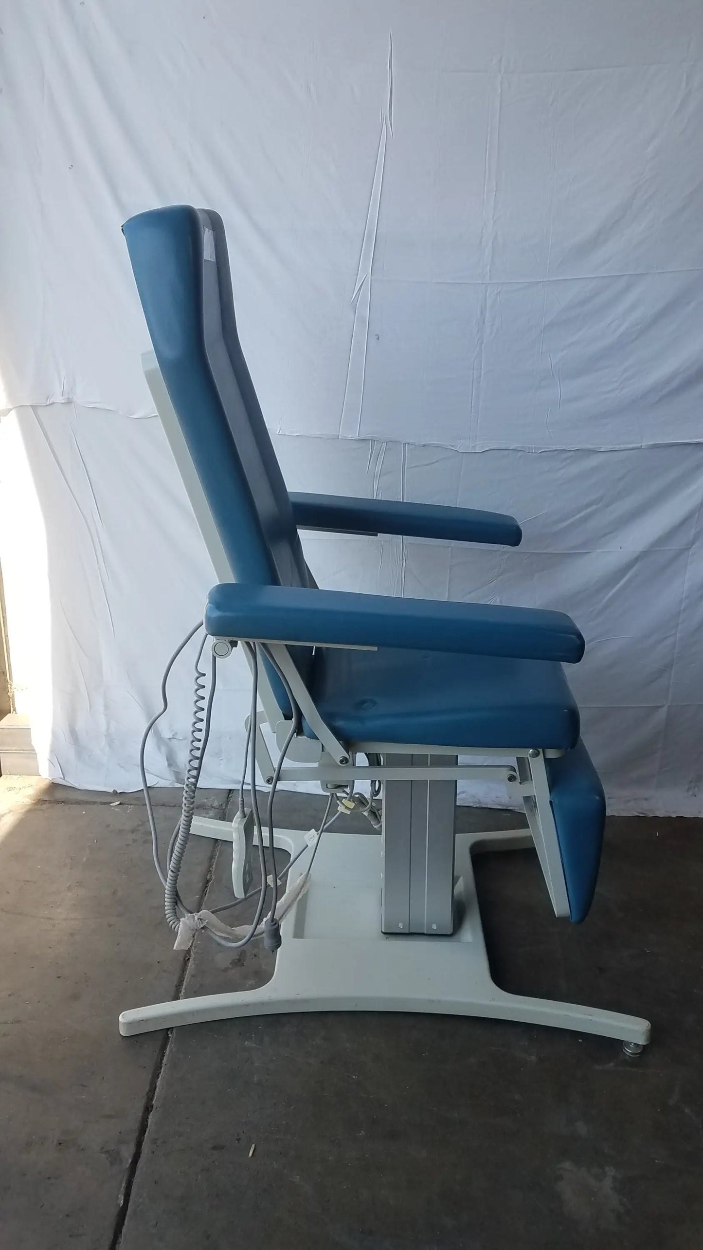 Blue upholstered UMF medical equipment 29ZE 8677 power exam phlebotomy chair with white metal frame and adjustable footrest