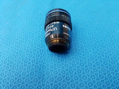 Black Olympus UPlanSApo 40x microscope objective with 0.90 numerical aperture and FN26.5 field number metallic threading