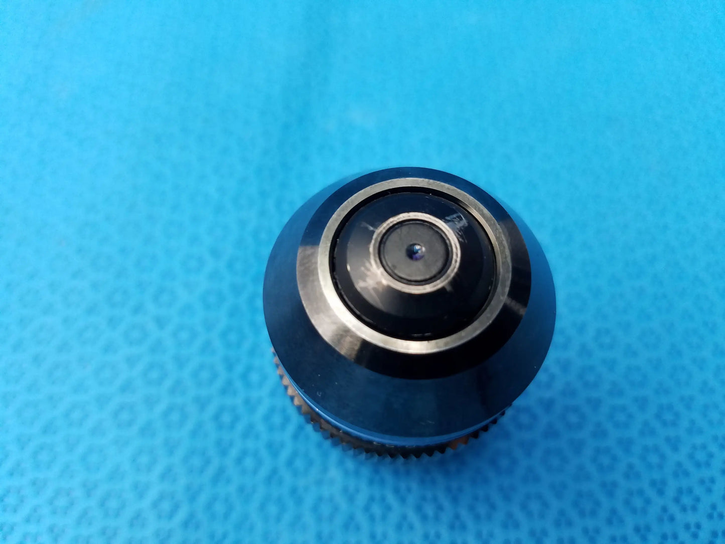 UPlanSApo 40x microscope objective with black and silver design featuring textured grip ring numerical aperture 0.90 field number 26.5