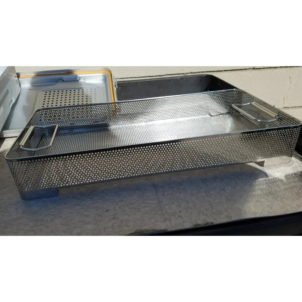 Rectangular stainless steel mesh tray with integrated handles for VMueller dincd3-5lt genesis carefusion sterilization container
