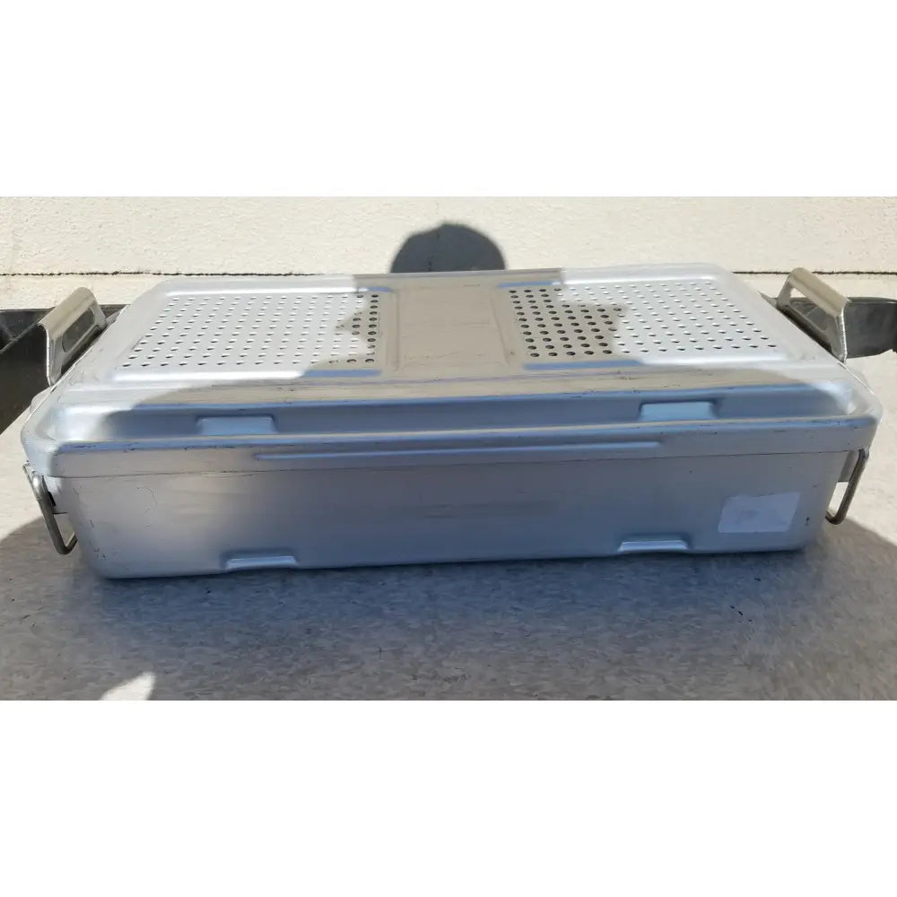 Silver metallic rectangular genesis sterilization container dincd3-5lt with perforated lid and side handles 5 inches deep