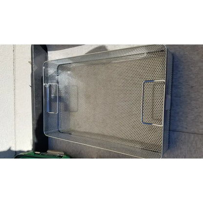 Rectangular stainless steel mesh tray with two side handles in genesis carefusion sterilization container cd2-5c