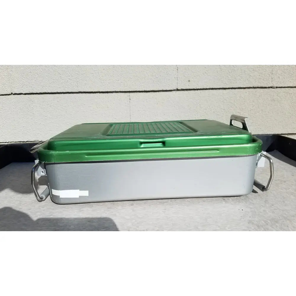 Green and gray plastic genesis carefusion sterilization container with metal handles 5 inch deep solid cd2-5c