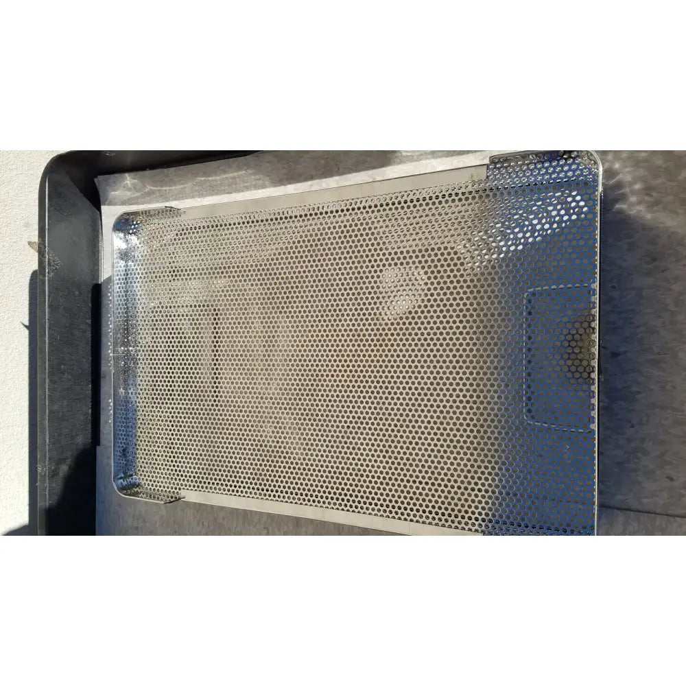 Silver perforated metal baking tray with rectangular handle for genesis carefusion sterilization container cd2-5c