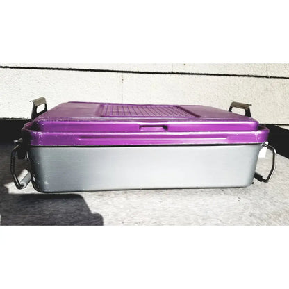 Purple and gray plastic genesis carefusion sterilization container with black metal handles 5 inch deep storage bin