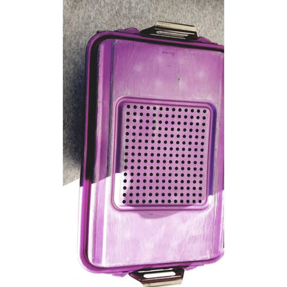 Purple plastic genesis carefusion sterilization container with perforated panel and metallic latches 5 inches deep
