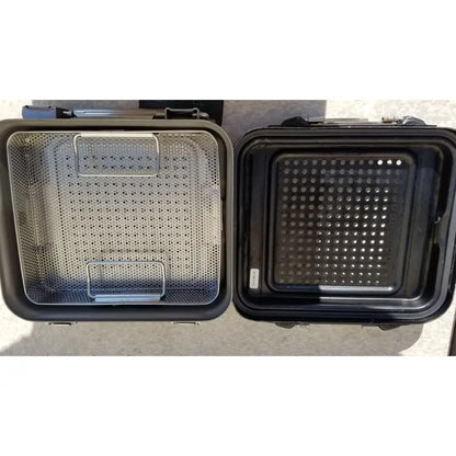 Black and silver stainless steel mesh baking trays with reinforced handles for oven use in genesis carefusion sterilization container