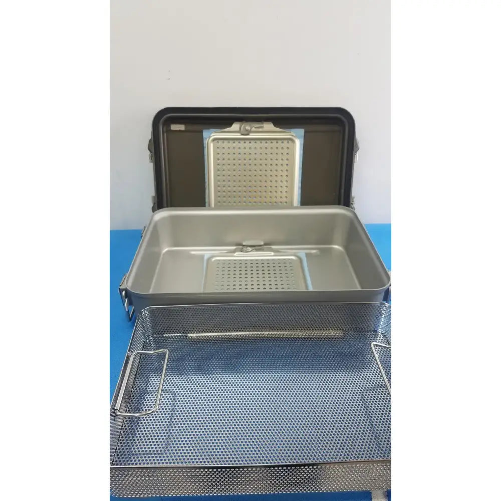 Reuse Medical V. Mueller Genesis CD2-5B Mid-Length 5" Deep Perforated Sterilization Container Sterilization Trays & Cases, second-hand product photo 1