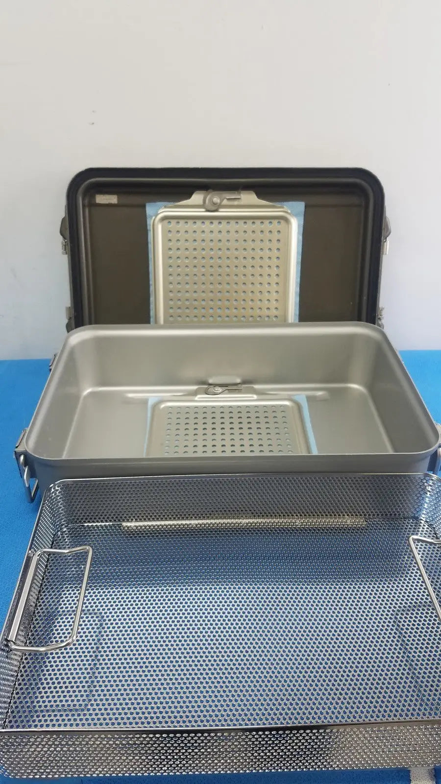 Reuse Medical V. Mueller Genesis CD2-5B Mid-Length 5" Deep Perforated Sterilization Container Sterilization Trays & Cases, second-hand product photo 1
