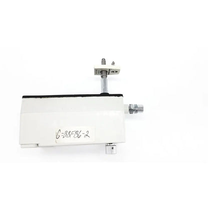 White rectangular industrial sensor with metallic fittings and label g=bbfb6-2 from vacutrol health care sugrical product