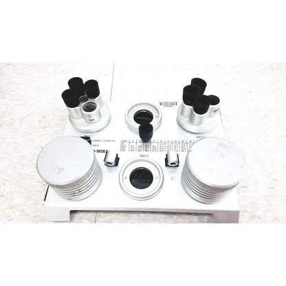 White plastic and metal refractometer with black lenses and labeled parts for vaisala hmk15 humidity calibrator use