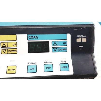 Black and white valleylab force electrosurgical unit control panel with teal foot pedal buttons for surgical functions