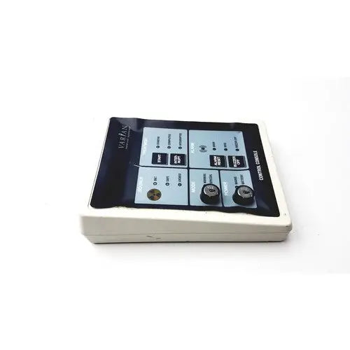 White rectangular varian control console gm11019270 with black and light blue interface featuring buttons and knobs for medical use
