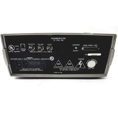 Black plastic vasamedics laserflo blood perfusion monitor back panel with silver knobs serial port and warning labels