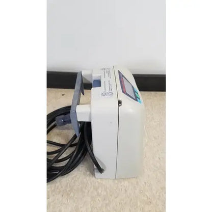 White medical infusion pump with digital display and black tubing for elite aircast dvt vascular pump system use