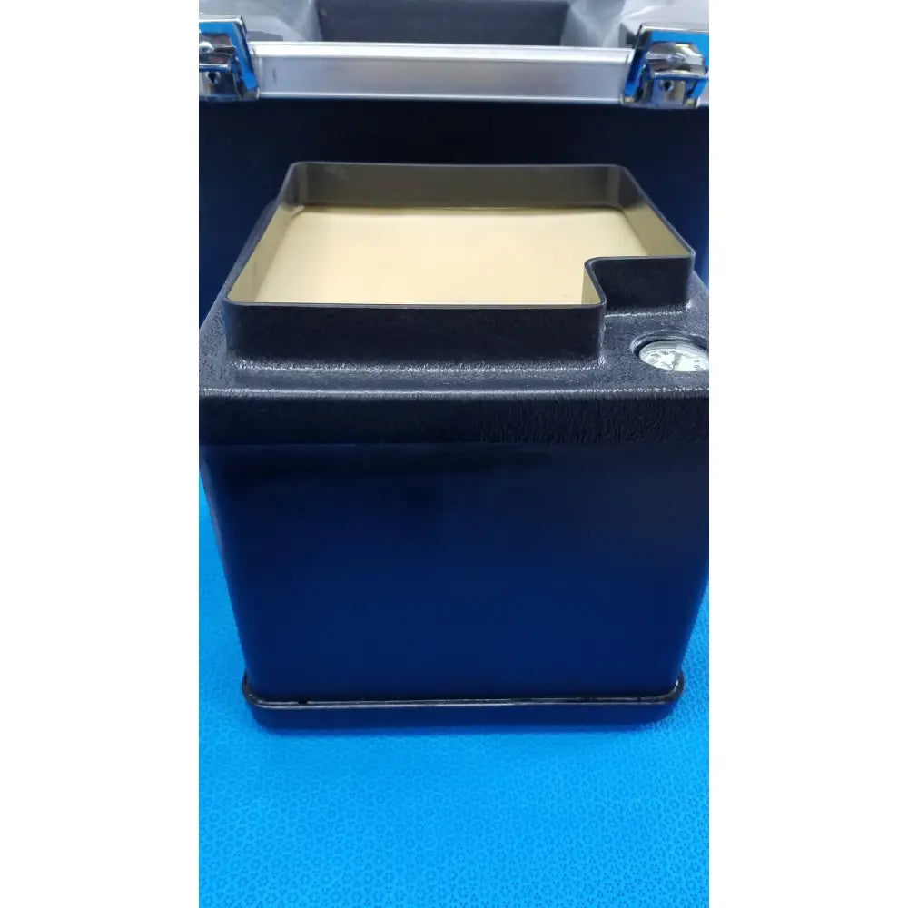 Black rectangular verathon bladderscan case with beige tissue equivalent bladder phantom tray and circular gauge on side