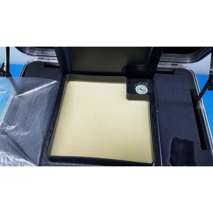 Beige rectangular verathon bladderscan tissue equivalent bladder phantom pressure plate with attached circular gauge