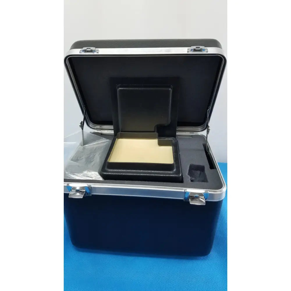 Black hard-shell carrying case with silver latches and molded interior for verathon bladderscan tissue equivalent bladder phantom