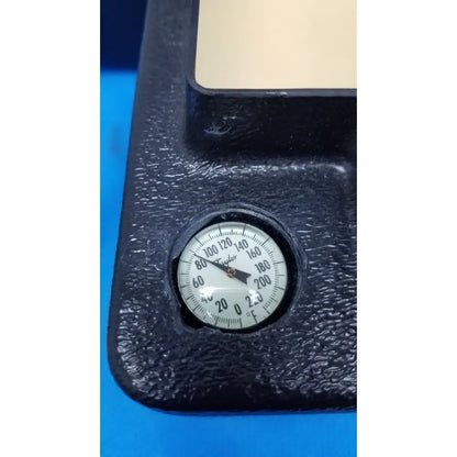 Black textured Taylor brand temperature gauge with white face and Fahrenheit scale for Verathon BladderScan tissue equivalent bladder phantom