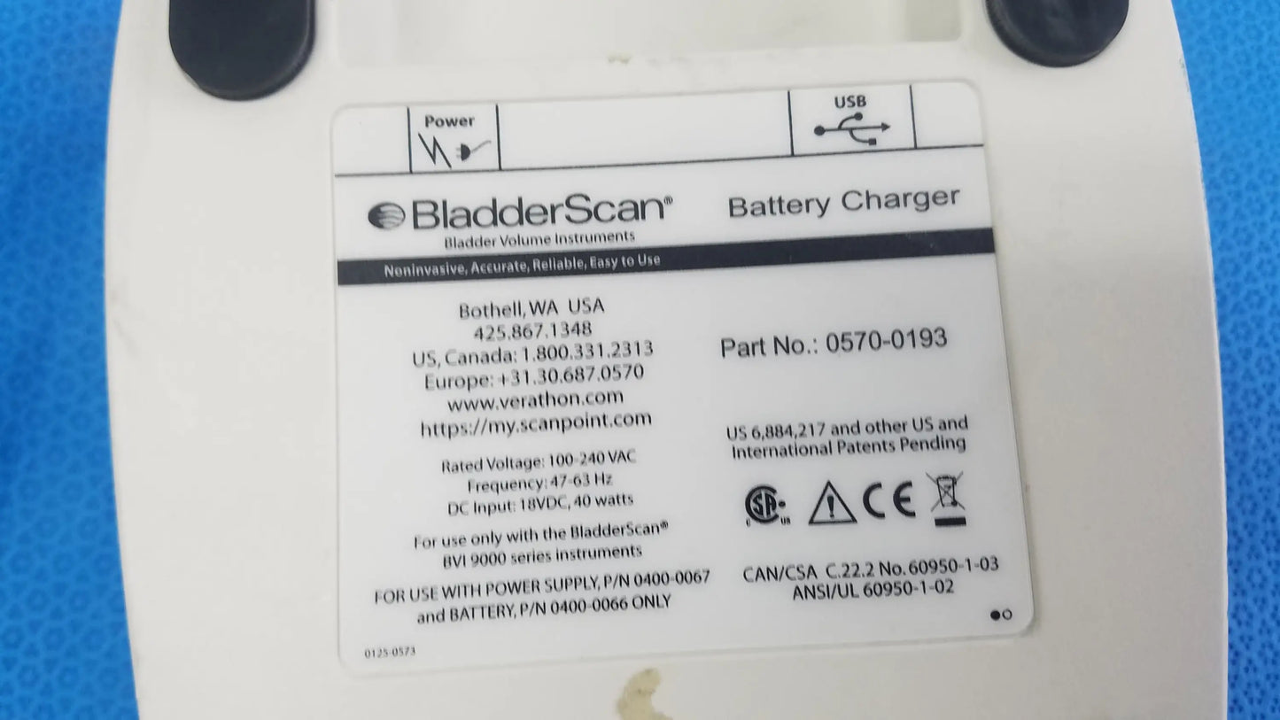 White plastic verathon bladderscan battery charger with black circular ports and label p n 0570-0193 compatible verathon bladderscan