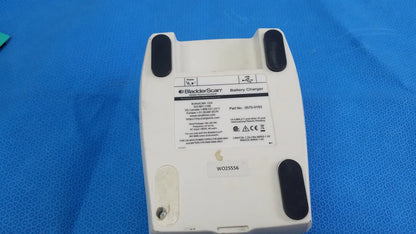White plastic black and decker battery charger with black rubber feet and part number 0670-9193 compatible verathon bladderscan