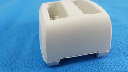 White plastic dual-slot verathon bladderscan battery charger base with rounded edges compatible verathon bladderscan