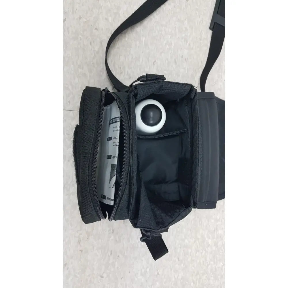 Black fabric medical bag containing a white and black blood pressure cuff for verathon bladderscan bvi handheld bladder scanner