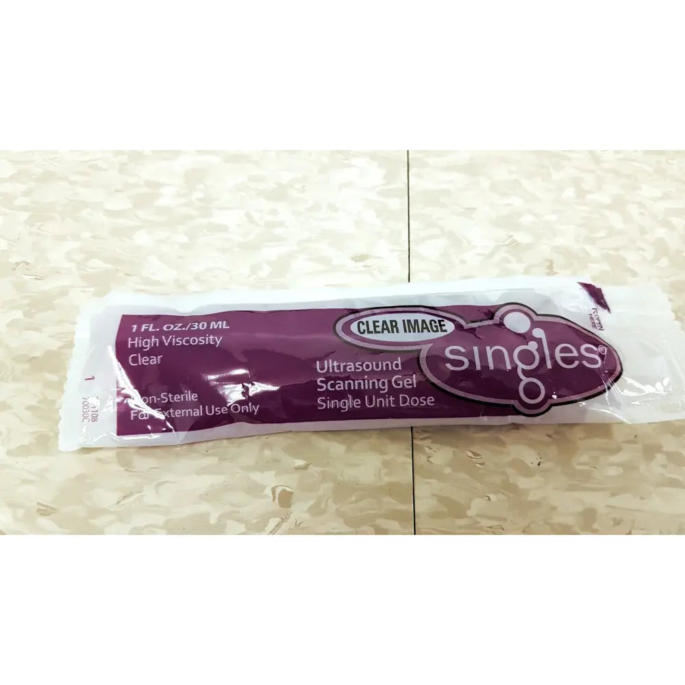 A single-use clear ultrasound scanning gel packet in a purple and white foil wrapper for verathon bladderscan bvi handheld bladder scanner