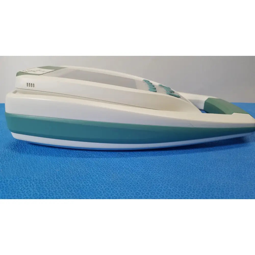 White and teal plastic verathon bladderscan bvi 9400 portable bladder scanner with curved design and green keypad buttons