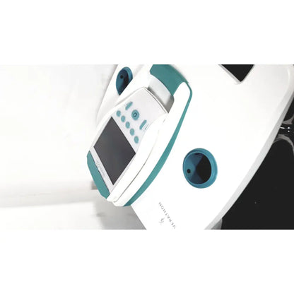 White and teal verathon bladderscan bvi 9600 medical infusion pump with digital display control buttons and circular ports