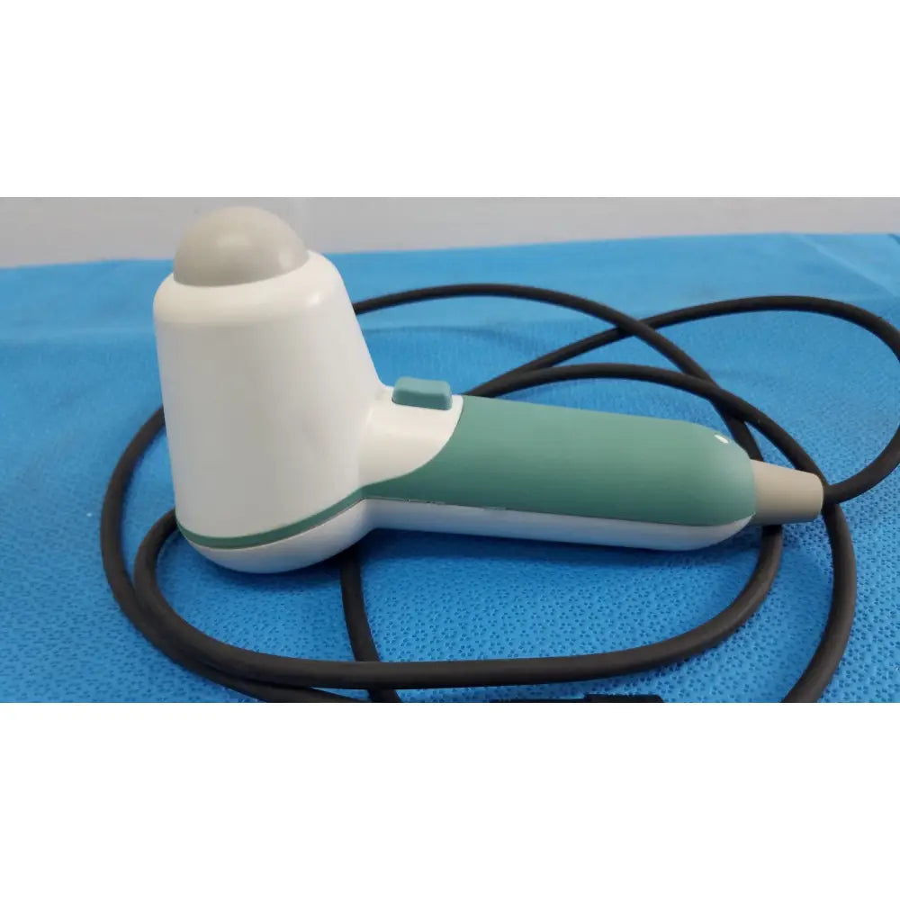 White and teal verathon bladderscan probe with rounded tip and coiled black cable for medical use