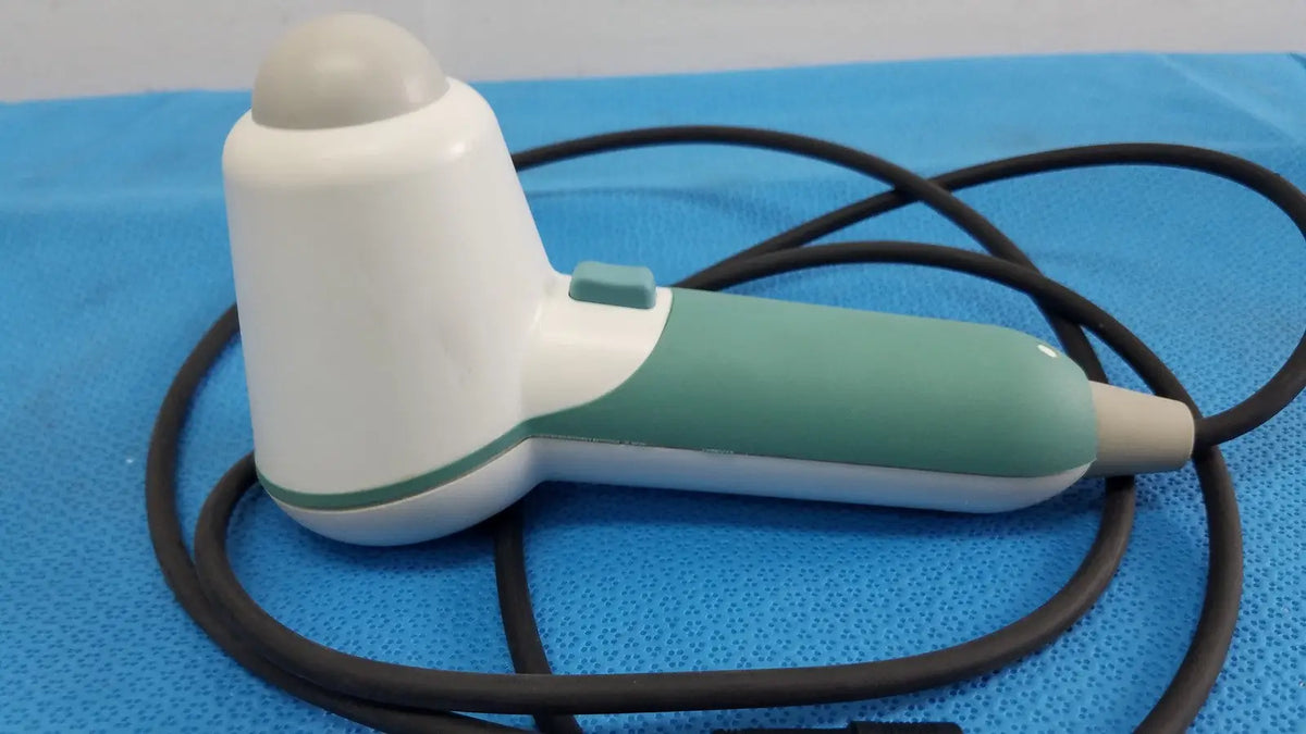 White and teal verathon bladderscan probe with rounded tip and coiled black cable for medical use