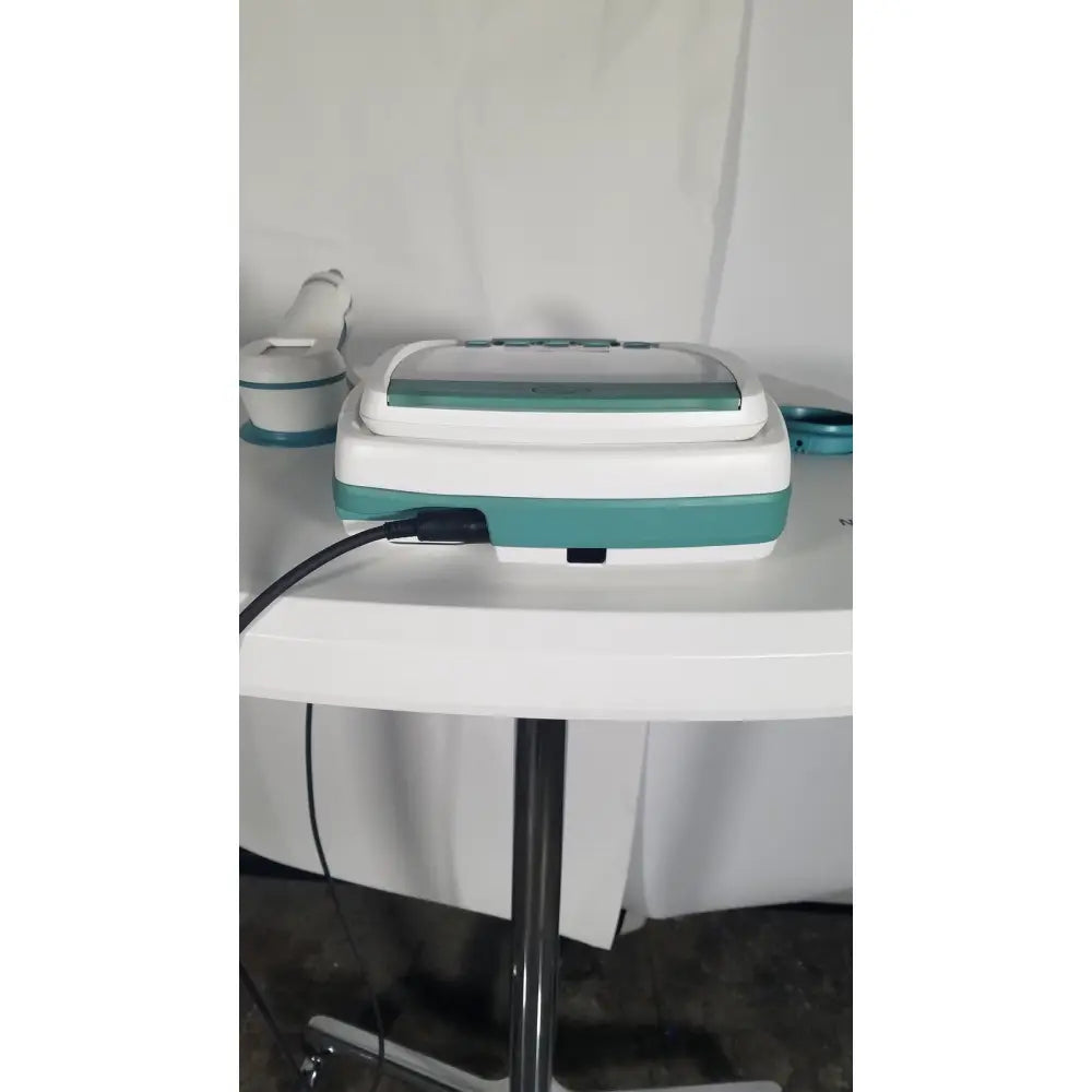 Teal and white medical-grade verathon bladderscan stand with sleek rectangular design and attached probe model 0570-0351