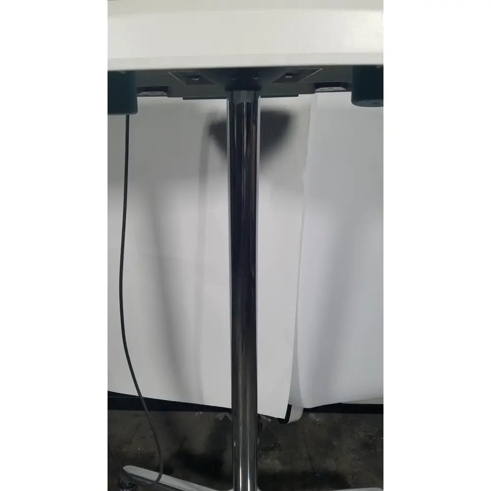 Chrome-finished metal table leg with sleek cylindrical design and sturdy base for verathon bladderscan stand reuse medical