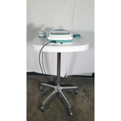 Teal and white Verathon BladderScan stand with probe on a wheeled cart for portable bladder scanning