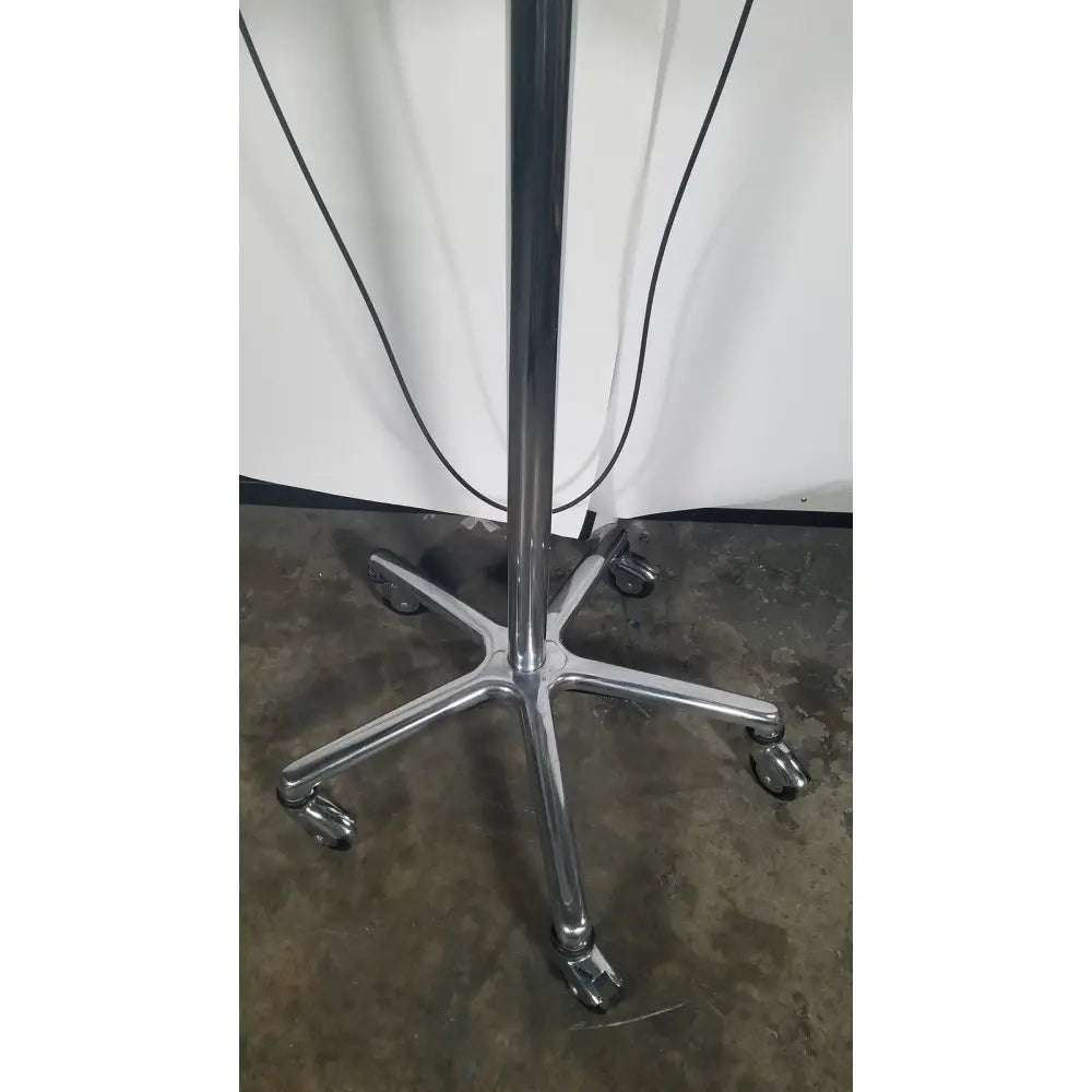 Verathon bladderscan stand with probe model 0570-0351 and chrome finished office chair with five-star base and caster wheels