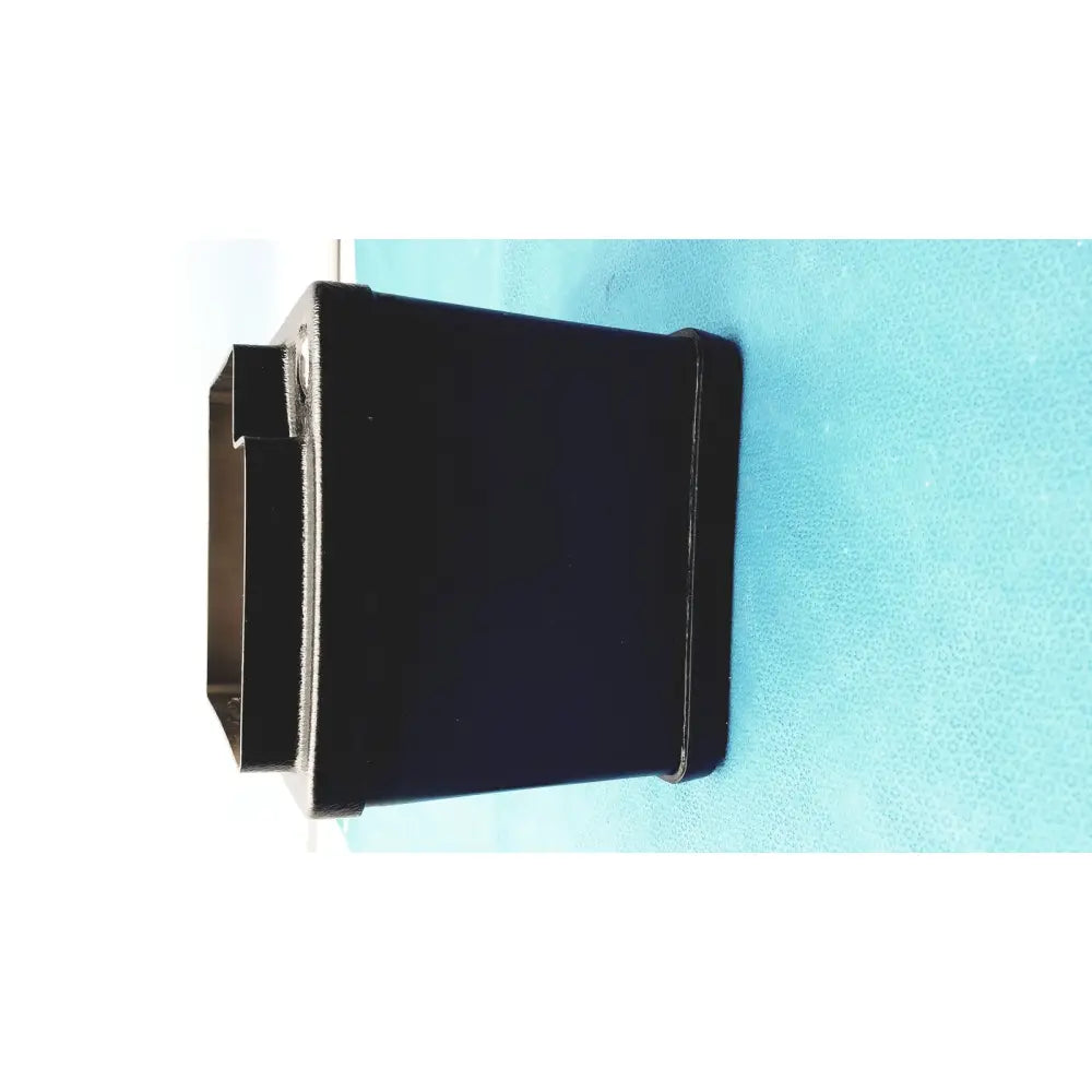 Black rectangular plastic verathon bladderscan tissue equivalent bladder phantom with textured surface and raised edges