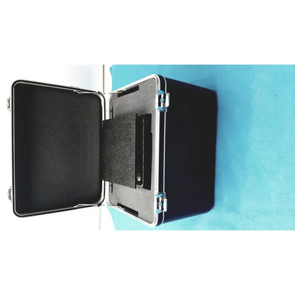 Black hard-shell carrying case with silver latches and foam-lined interior for verathon bladderscan tissue equivalent phantom