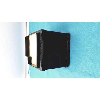 Black rectangular verathon bladderscan tissue equivalent bladder phantom with light beige plastic interior