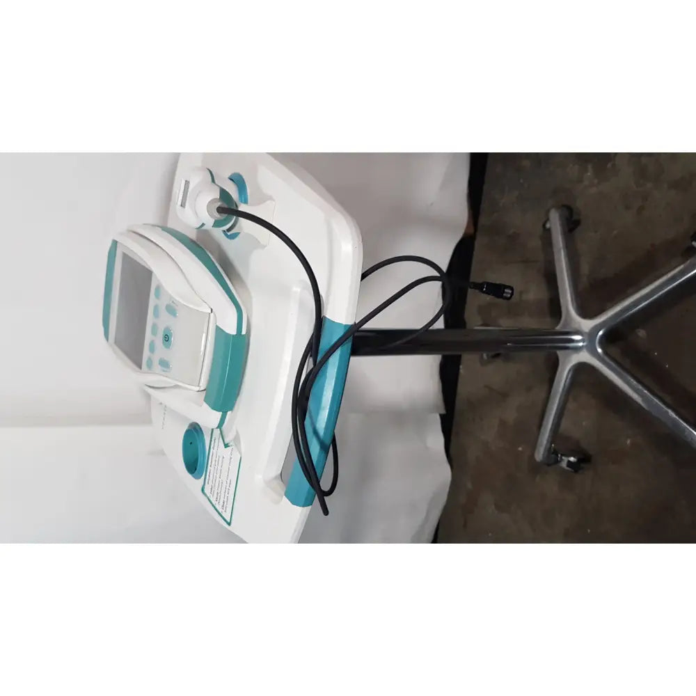 White and teal verathon bvi 9400 bladder scan ultrasound scanner with digital screen and rolling stand with cables