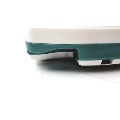White and teal plastic base of verathon bvi 9400 bladder scanner sn-b4010970 showing back side of the bladder scanner