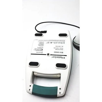 White and teal plastic Verathon BVI bladder scanner with black cable designed for reuse medical applications