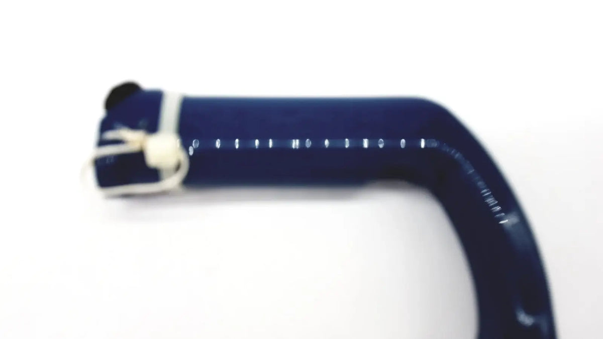 Dark blue silicone wristband with white stitching and black button for verathon glidescope reusable camera blade