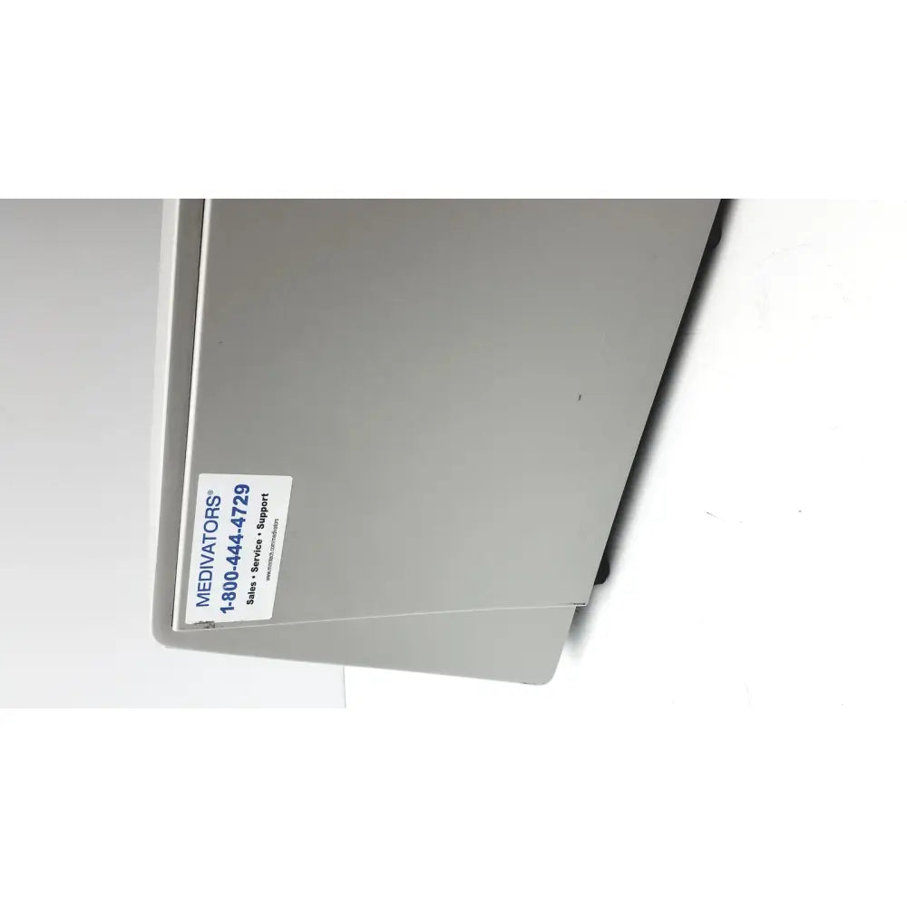 Gray medivators veriscan lt automated endoscope leak tester with white label showing brand name and contact information